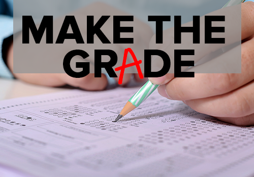 Image of a hand on a scantron sheet filling in a bubble with a pencil with text that reads MAKE THE GRADE
