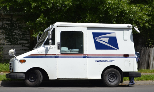 Image of a USPS Delivery Vehicle.